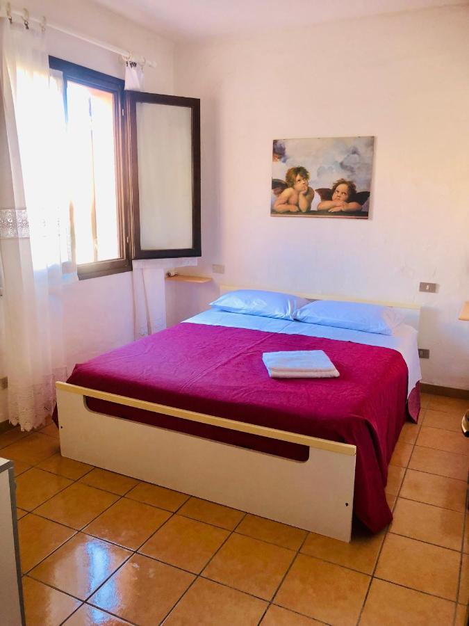 Le Residenze Itaca Apartment Porto Pozzo Bagian luar foto